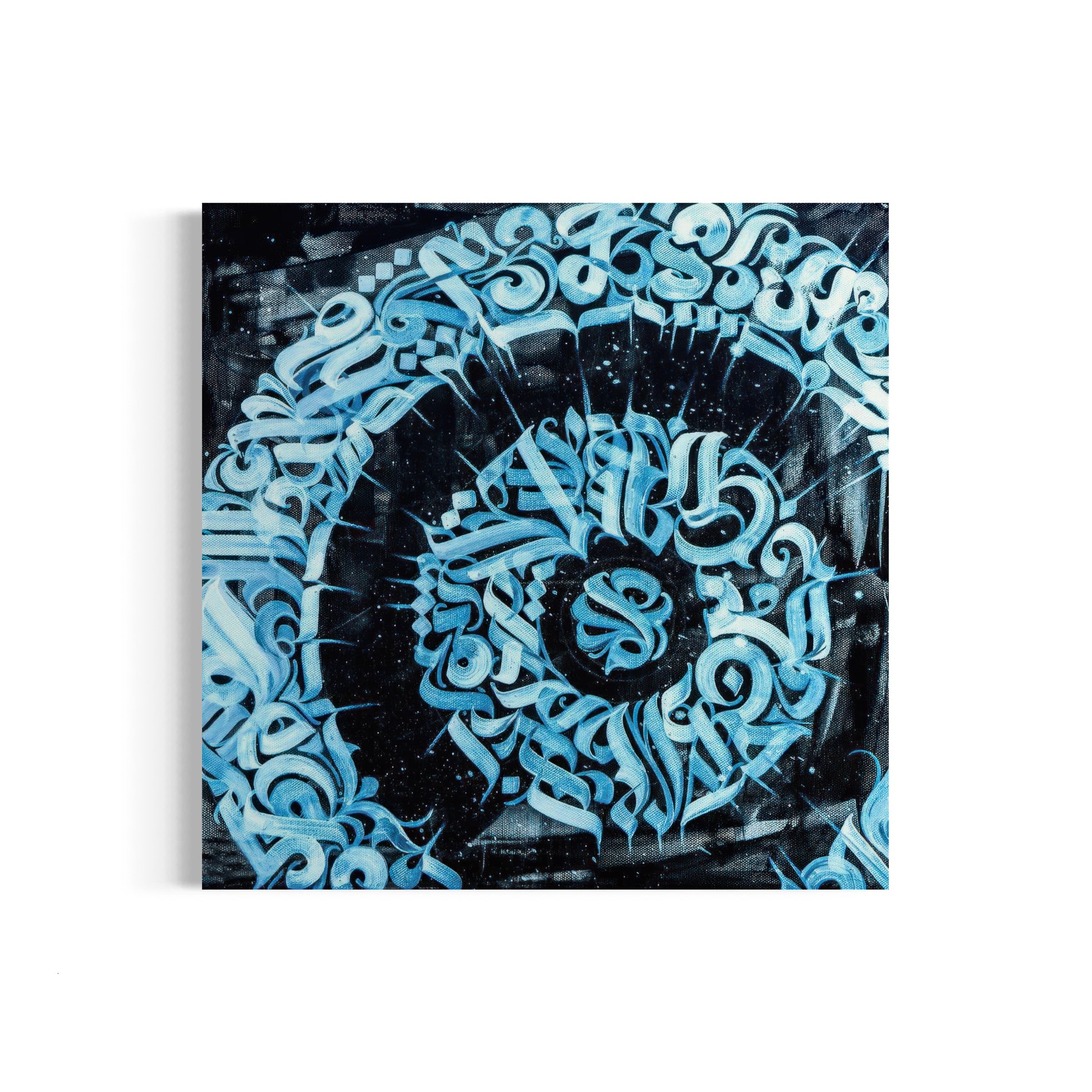a blue and black painting on a white wall