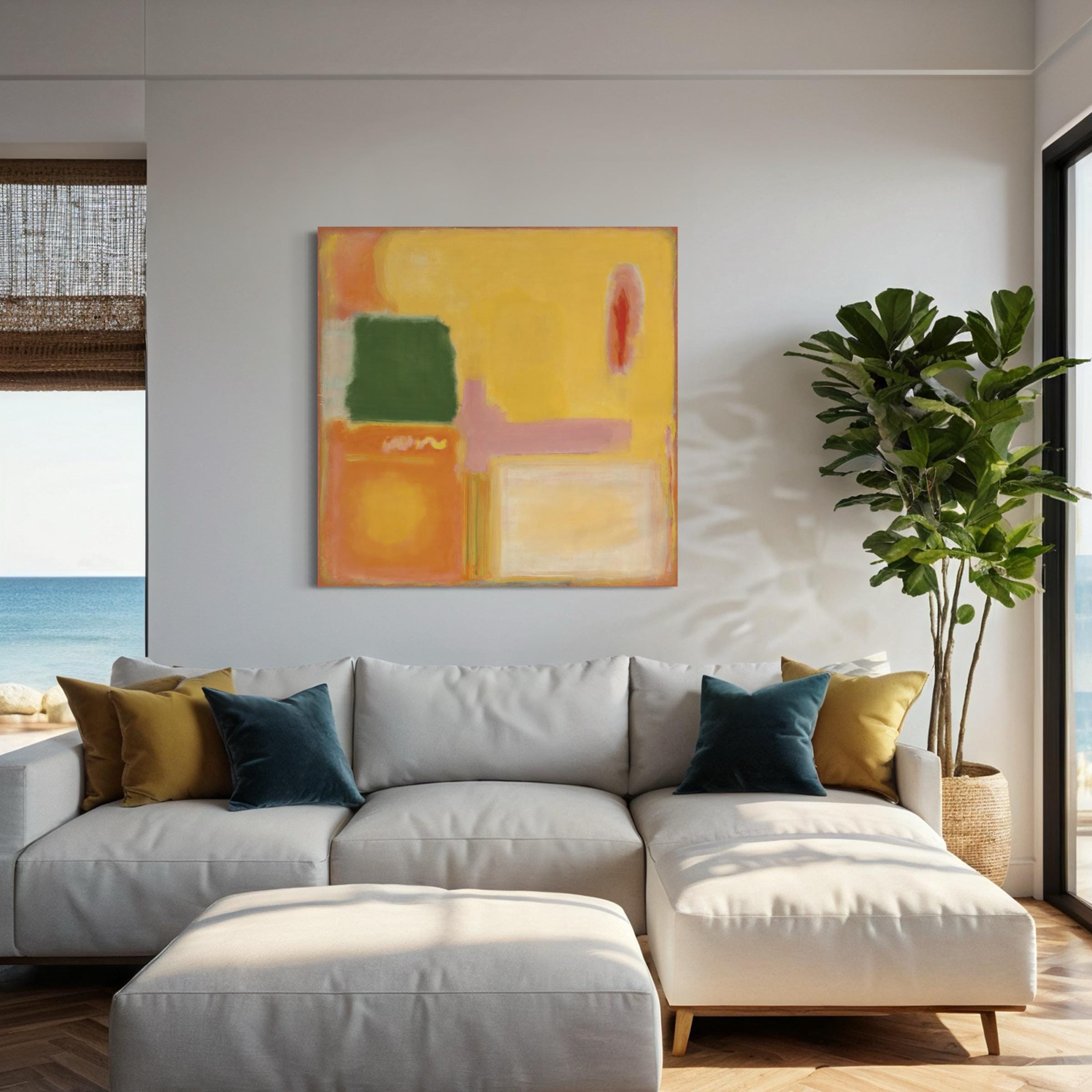May include: A white sectional sofa with two pillows, one green and one yellow, in front of a painting with abstract shapes in yellow, pink, green, and orange.