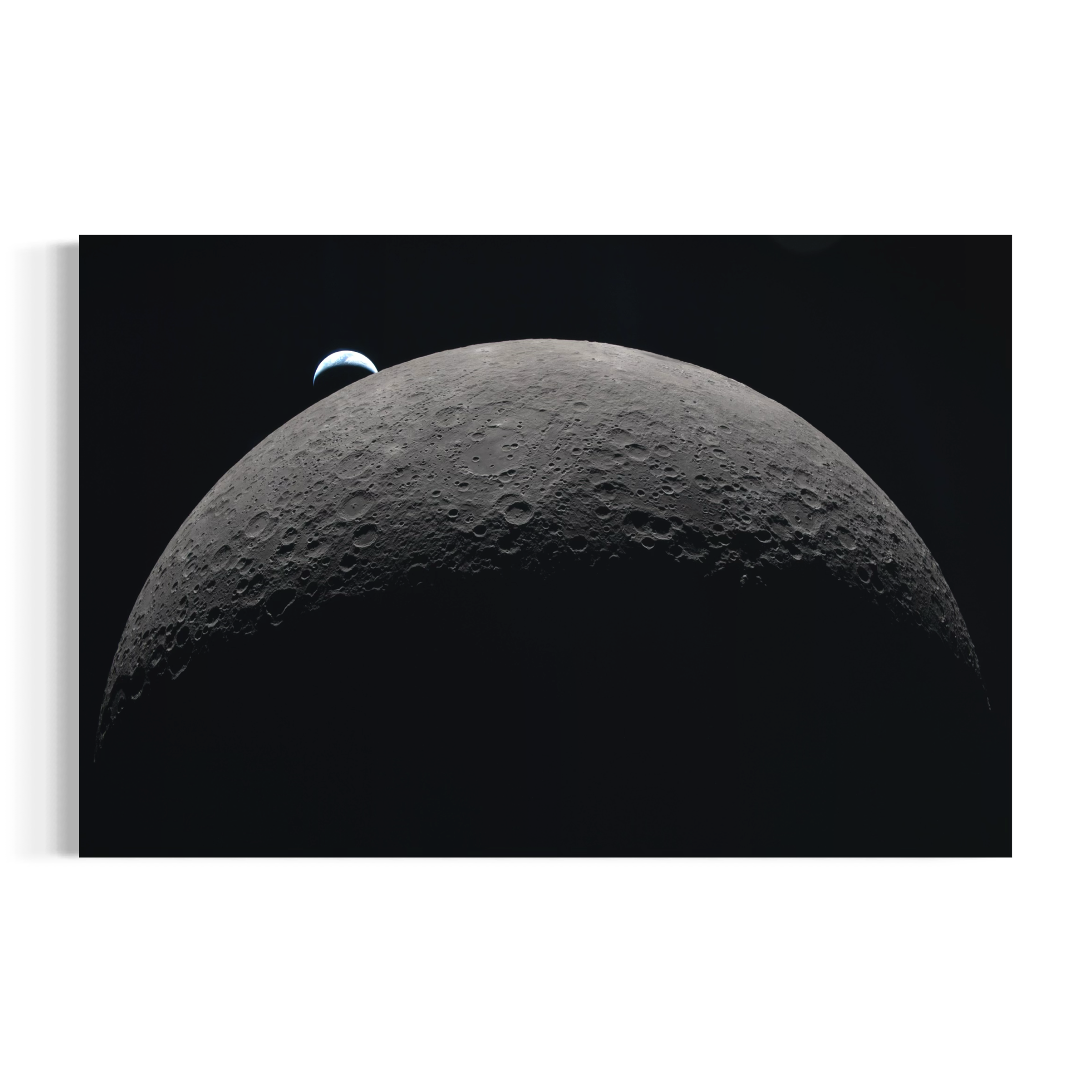 a large, craters-covered moon in the night sky, with a small portion of the moon visible in the top left corner.