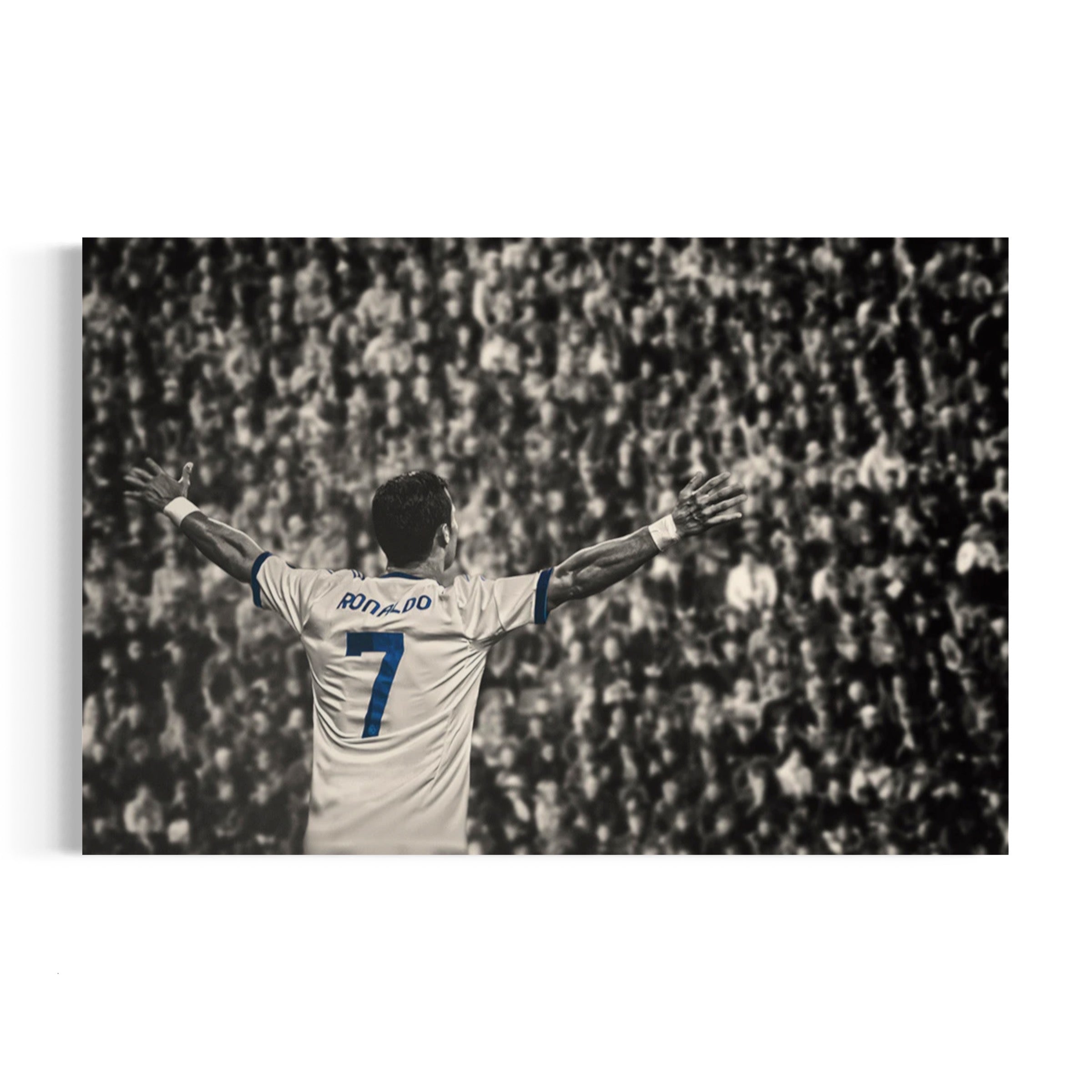 a black and white photo of a soccer player