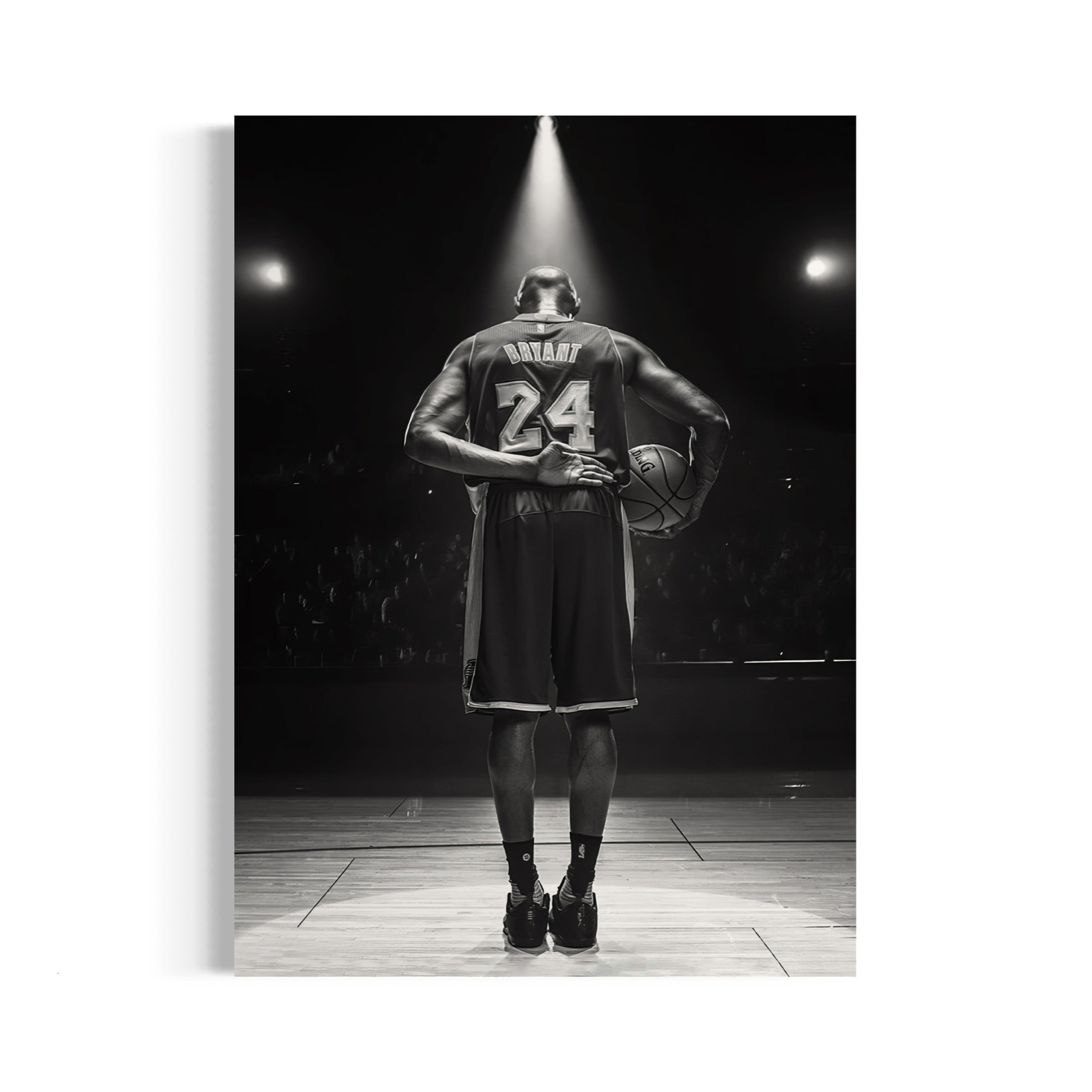 a black and white photo of a basketball player