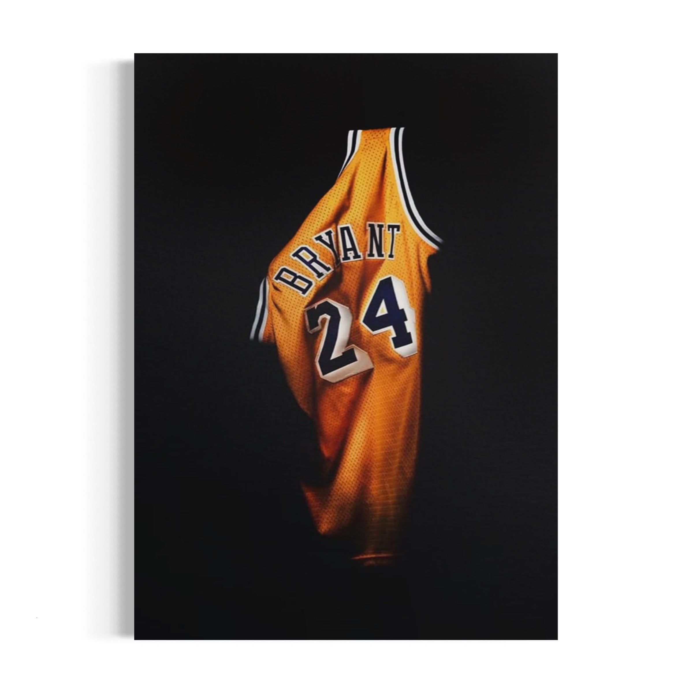 a basketball jersey hanging on a wall