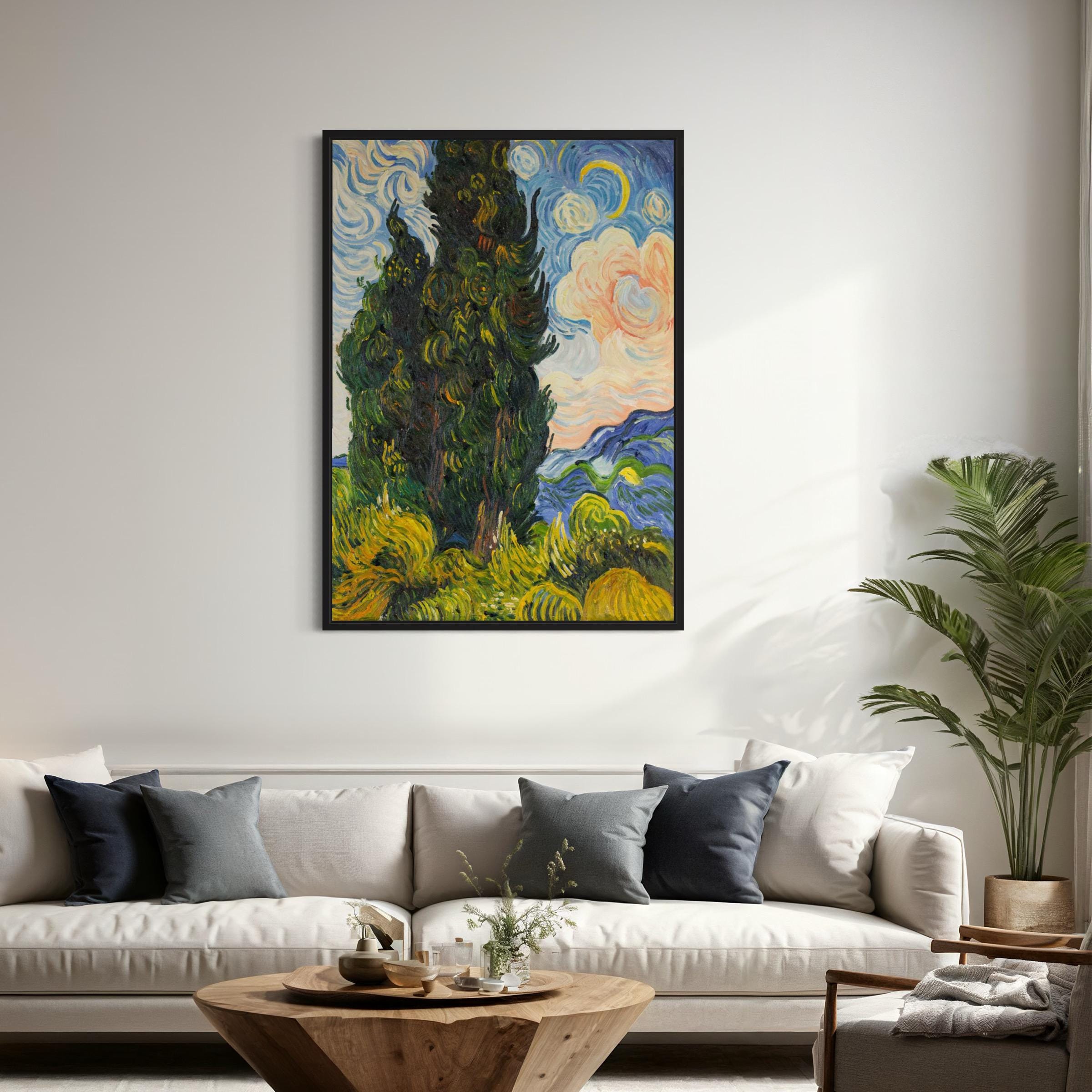 May include: A framed painting of a landscape with two tall, green cypress trees in the foreground. The sky is blue with white clouds and a crescent moon. The background is a rolling landscape of hills in shades of blue, green, and yellow. The painting is done in a style reminiscent of Vincent van Gogh, with thick brushstrokes and swirling lines.