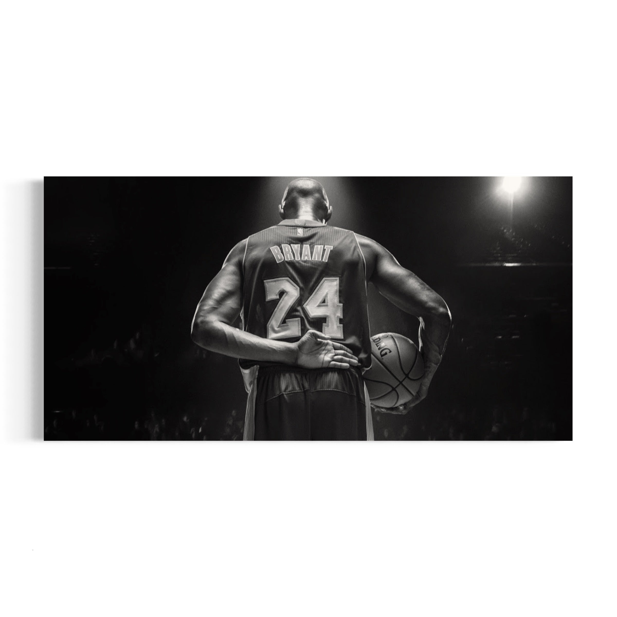 a black and white photo of a basketball player