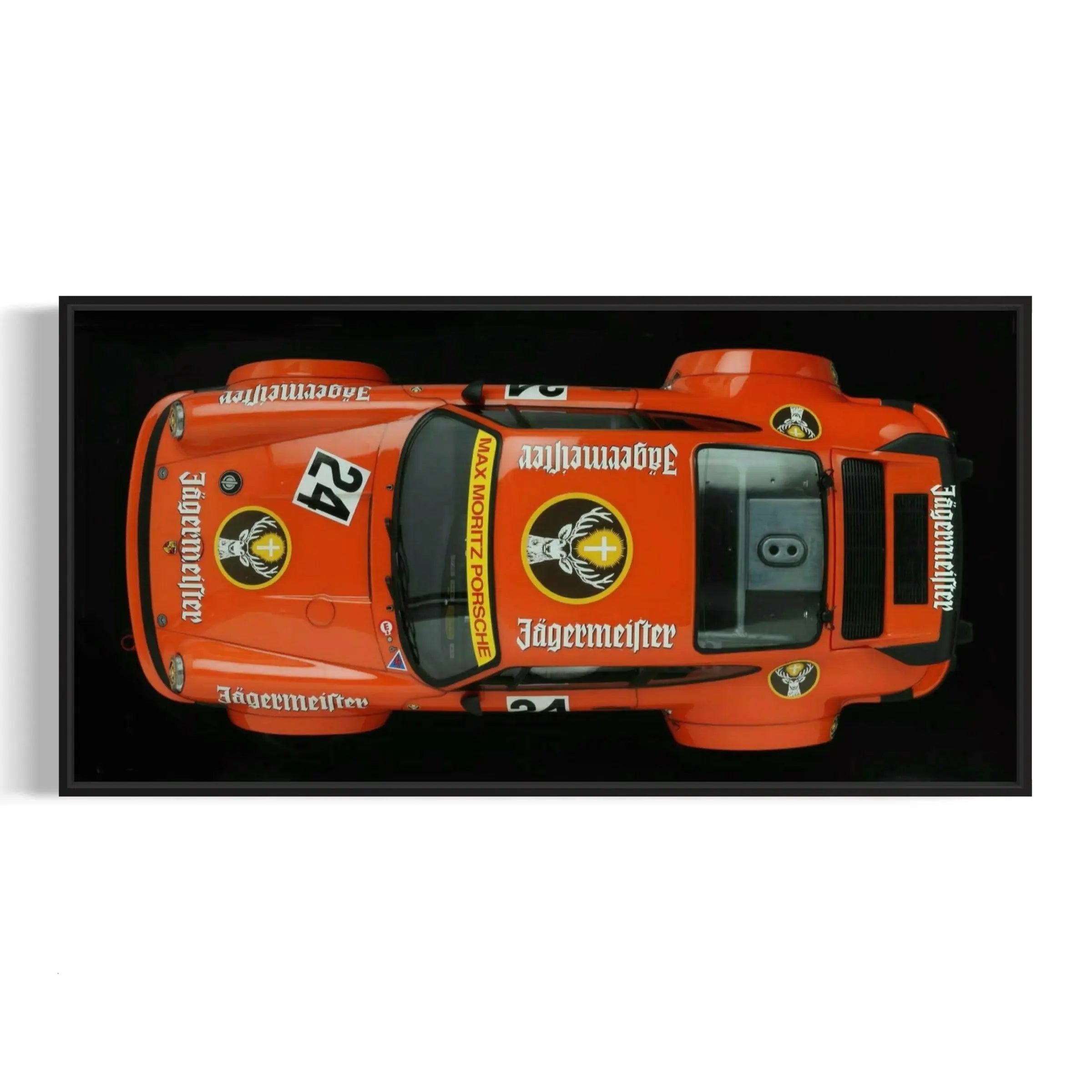 an orange race car is shown from above