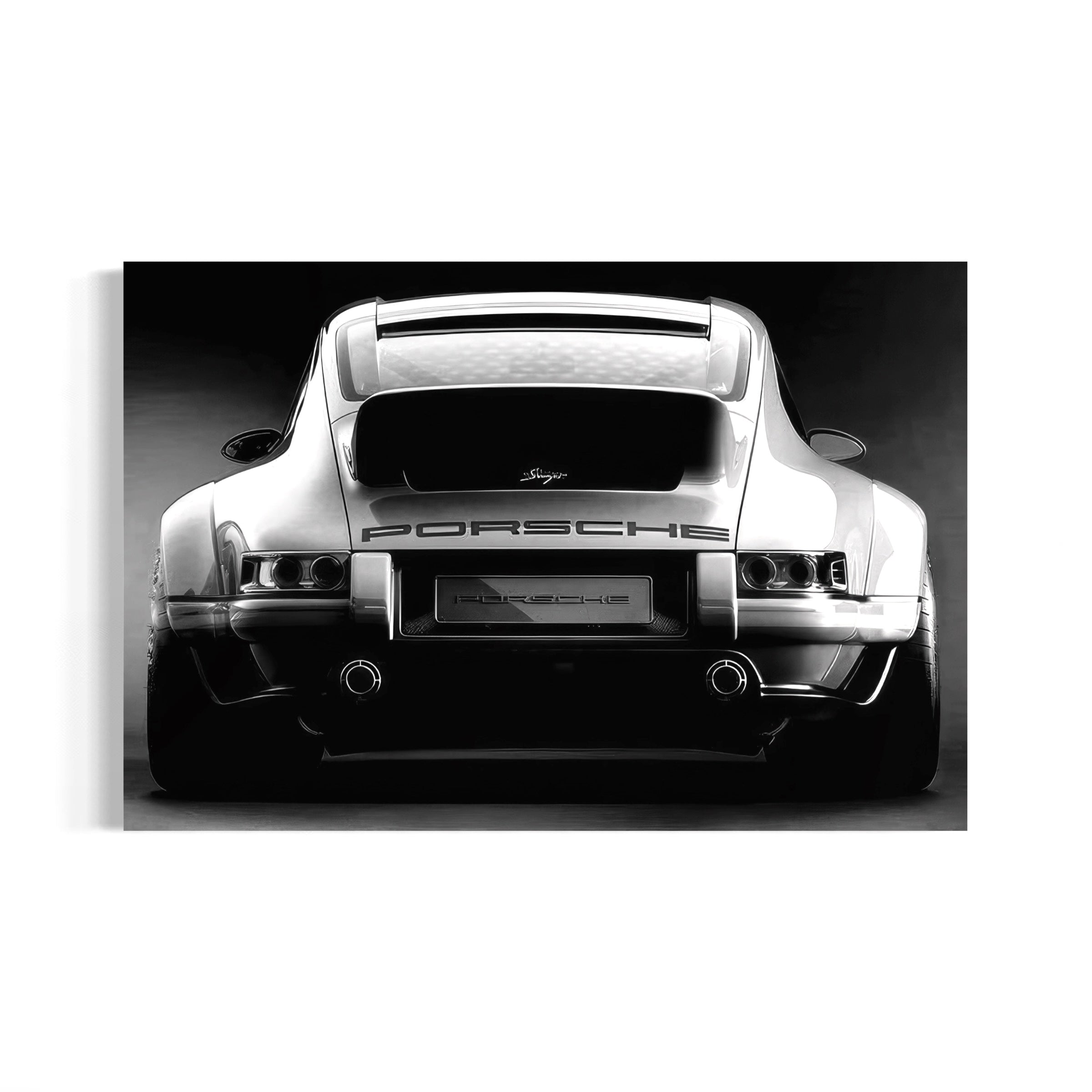 A black and white image of a Porsche sports car, showcasing its sleek design and powerful presence.