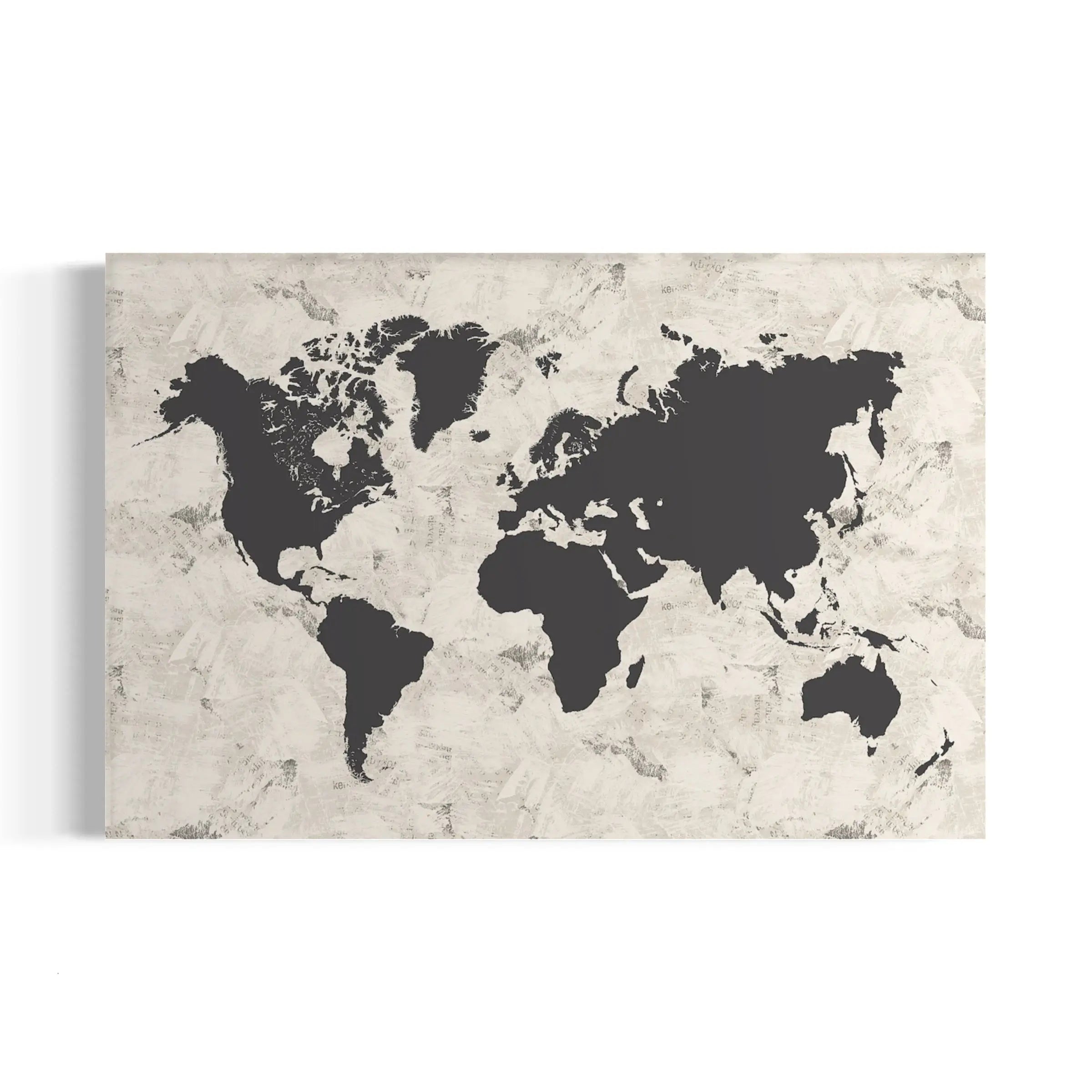 a black and white world map on a white wall