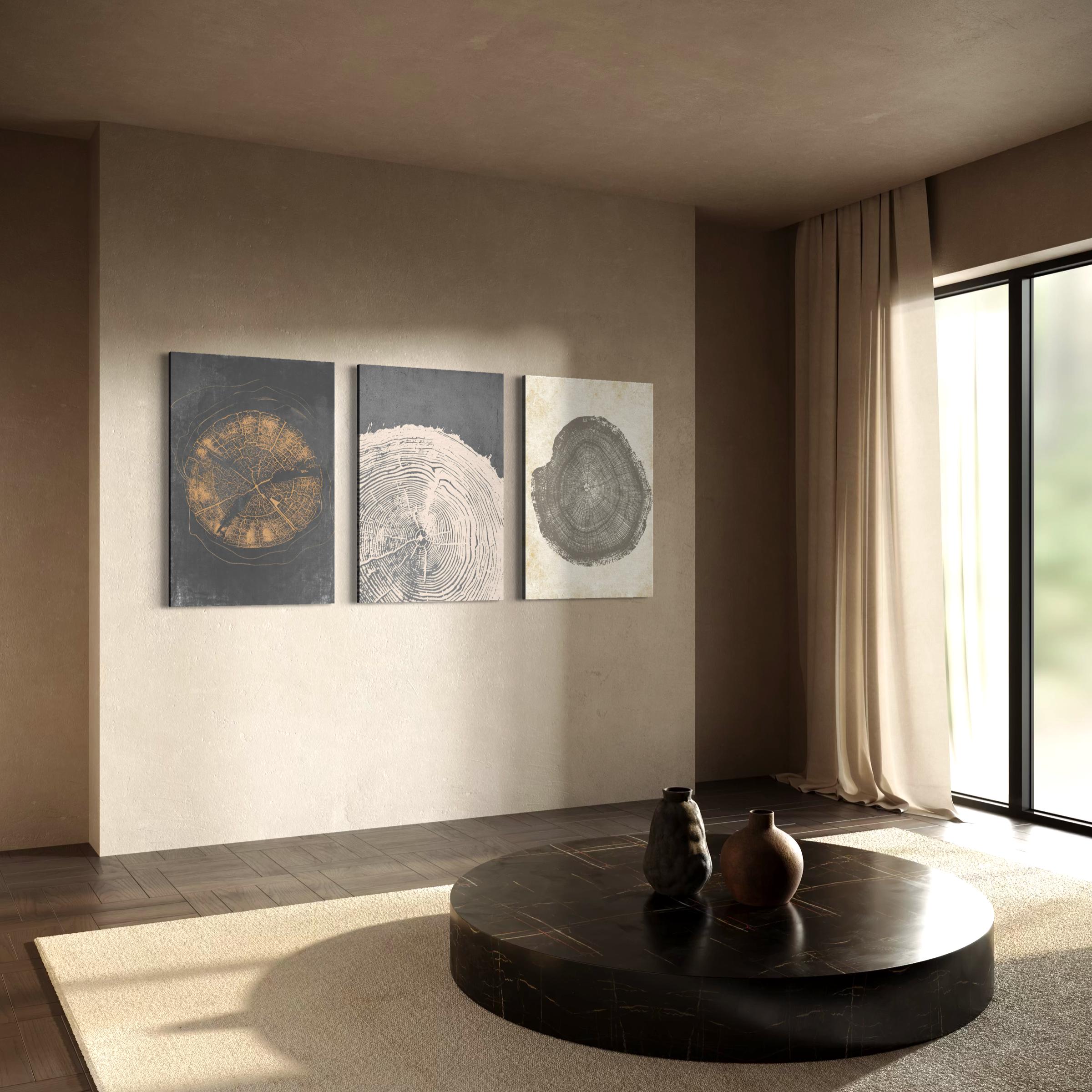 May include: Three framed canvas prints featuring cross-sections of trees. The prints display varying colors and textures, with a focus on the natural wood grain patterns. The artwork is displayed in a modern living room setting with a round coffee table and neutral-toned decor.