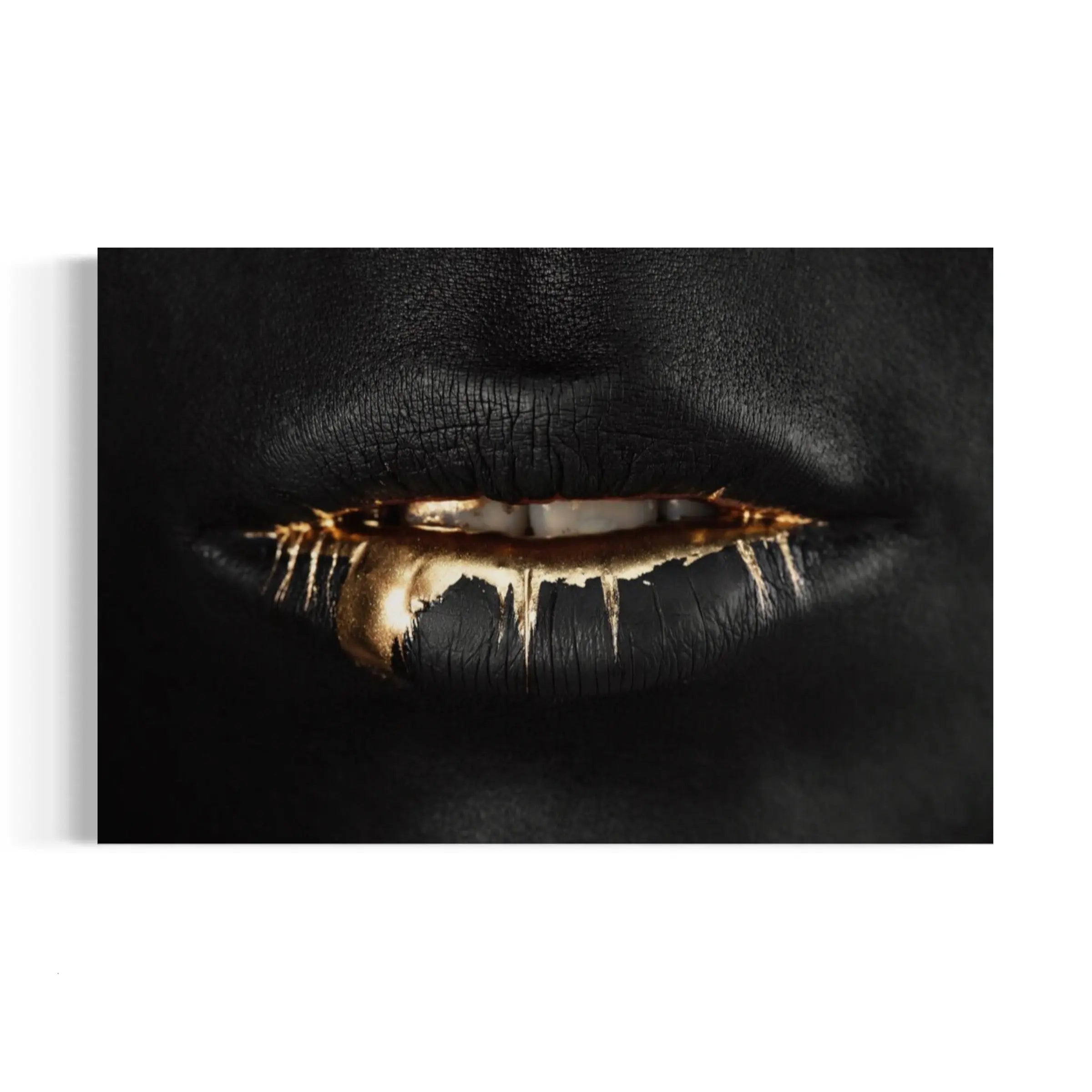 a close up of a woman's lips with gold and black makeup