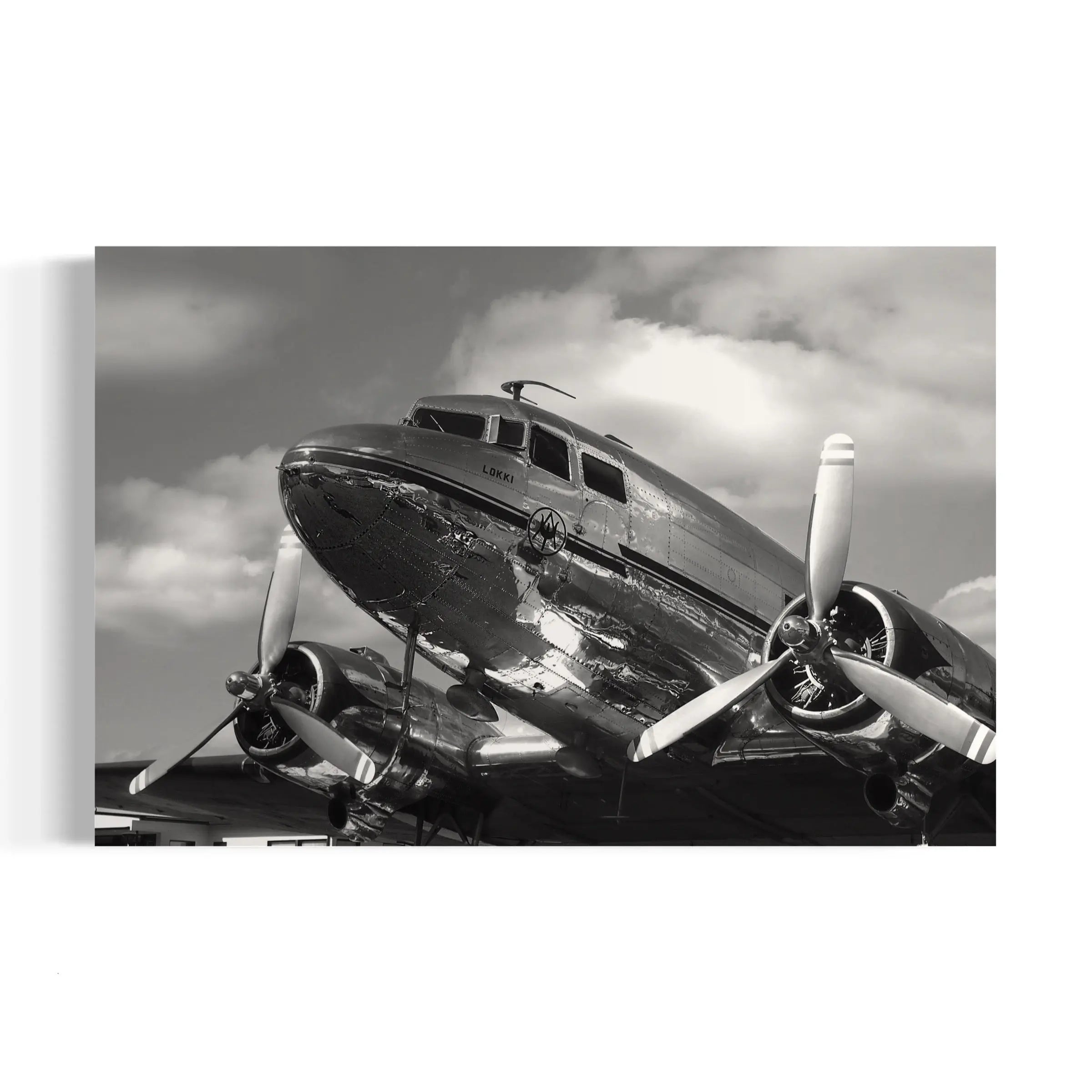 a black and white photo of an old airplane