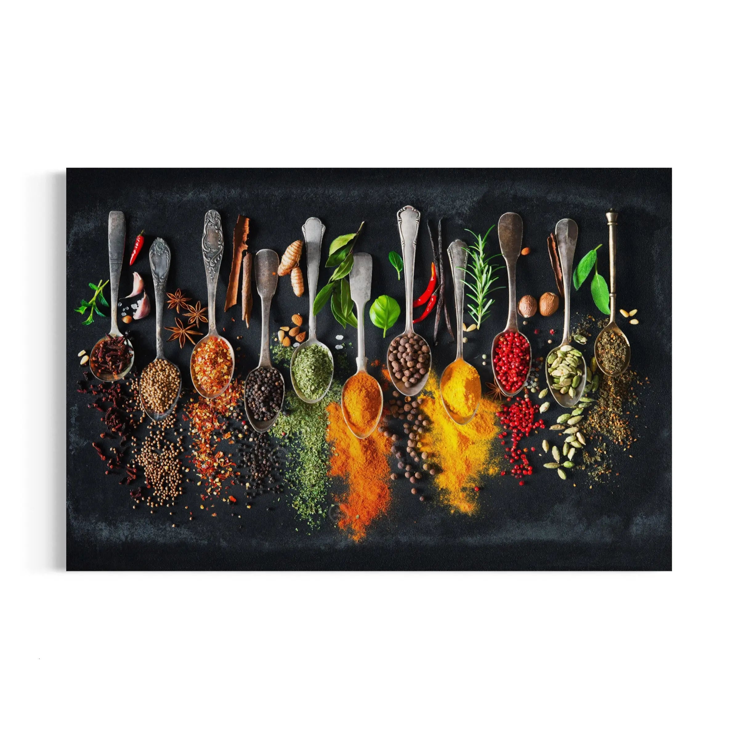 a group of spoons filled with different types of spices