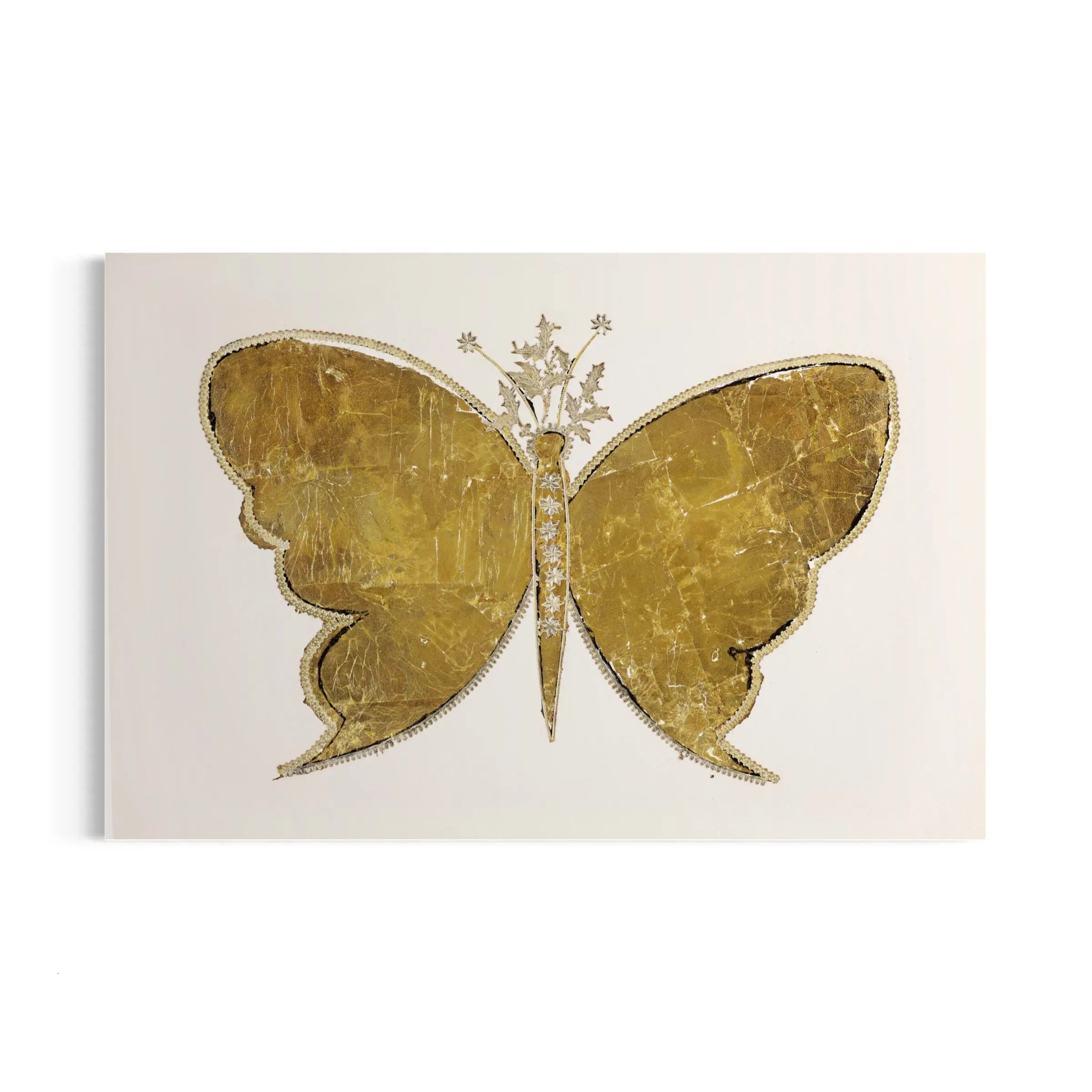 a golden butterfly on a white background