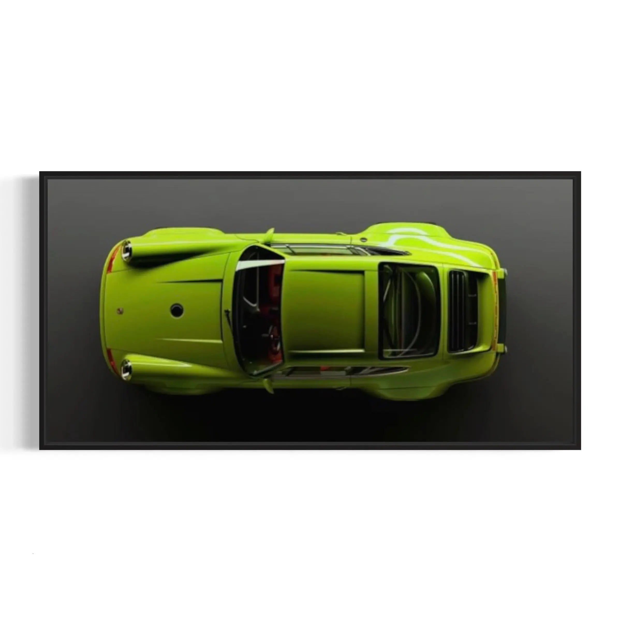 a green sports car is shown from above