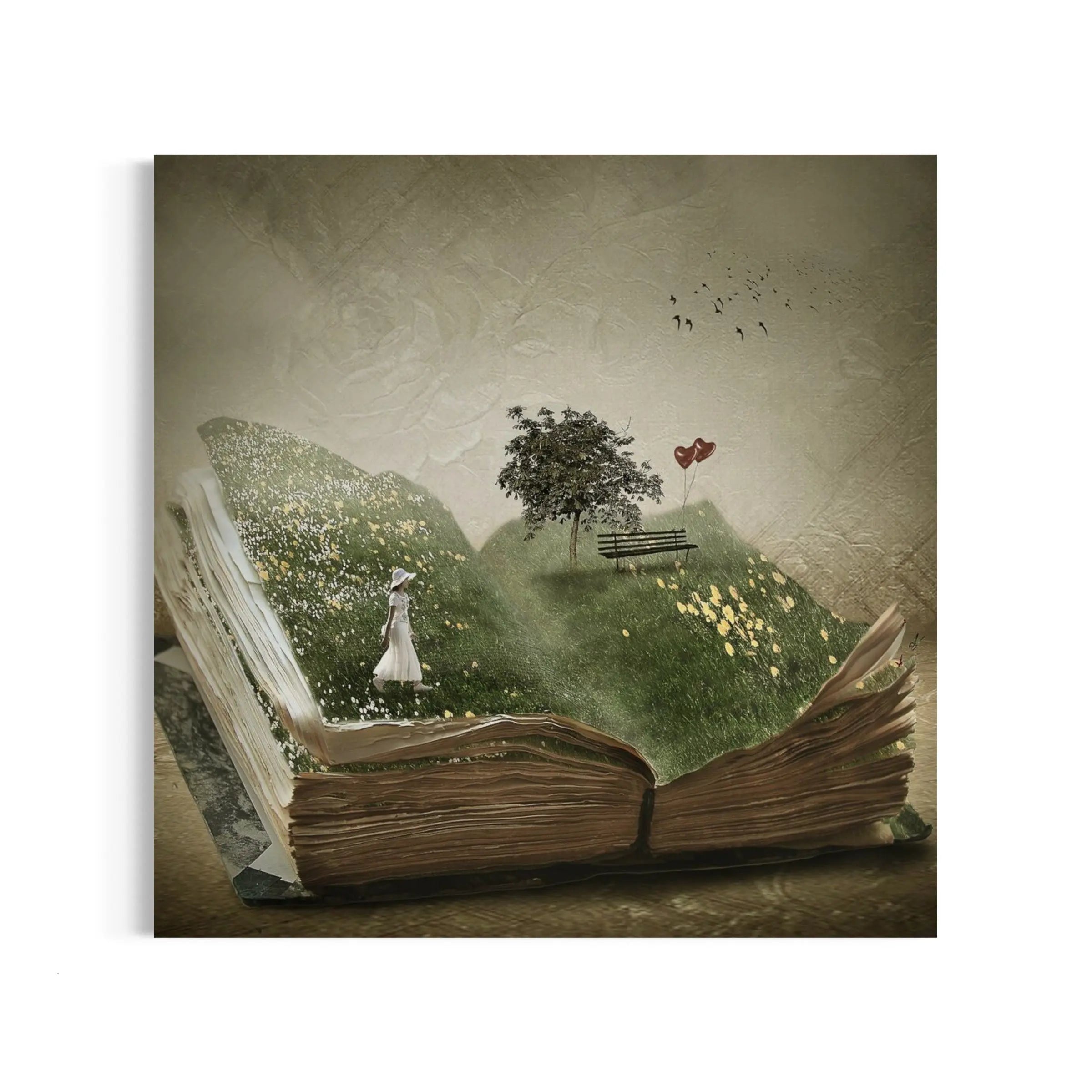 an open book with a picture of a tree on top of it