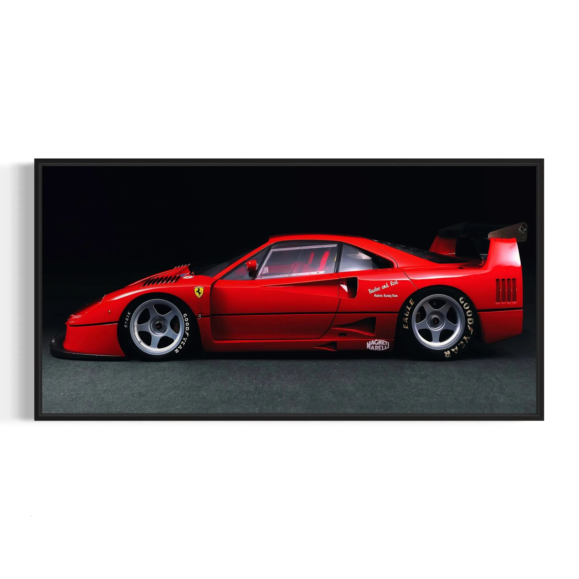 a picture of a red sports car on a black background