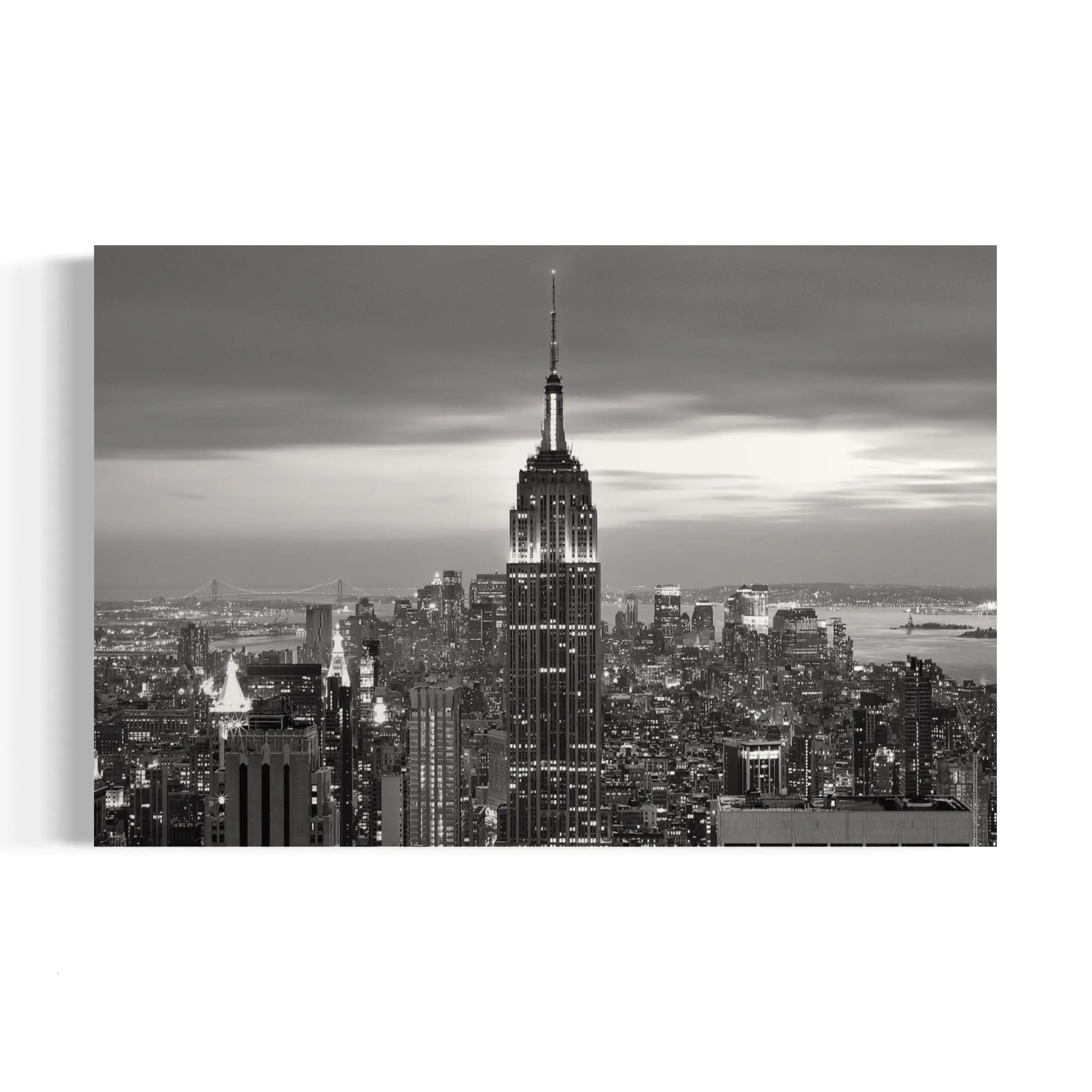 a black and white photo of the empire building in new york city