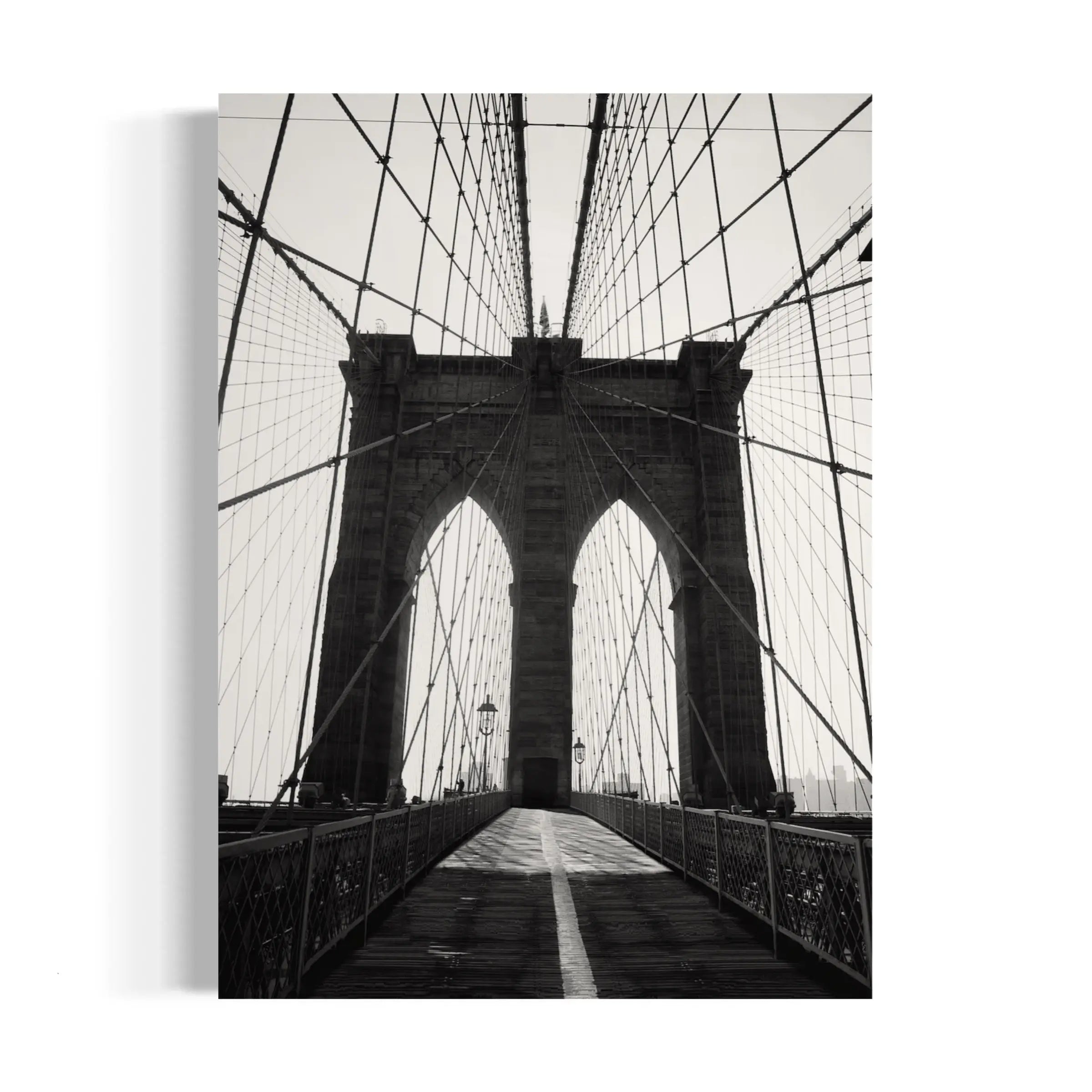 a black and white photo of the brooklyn bridge