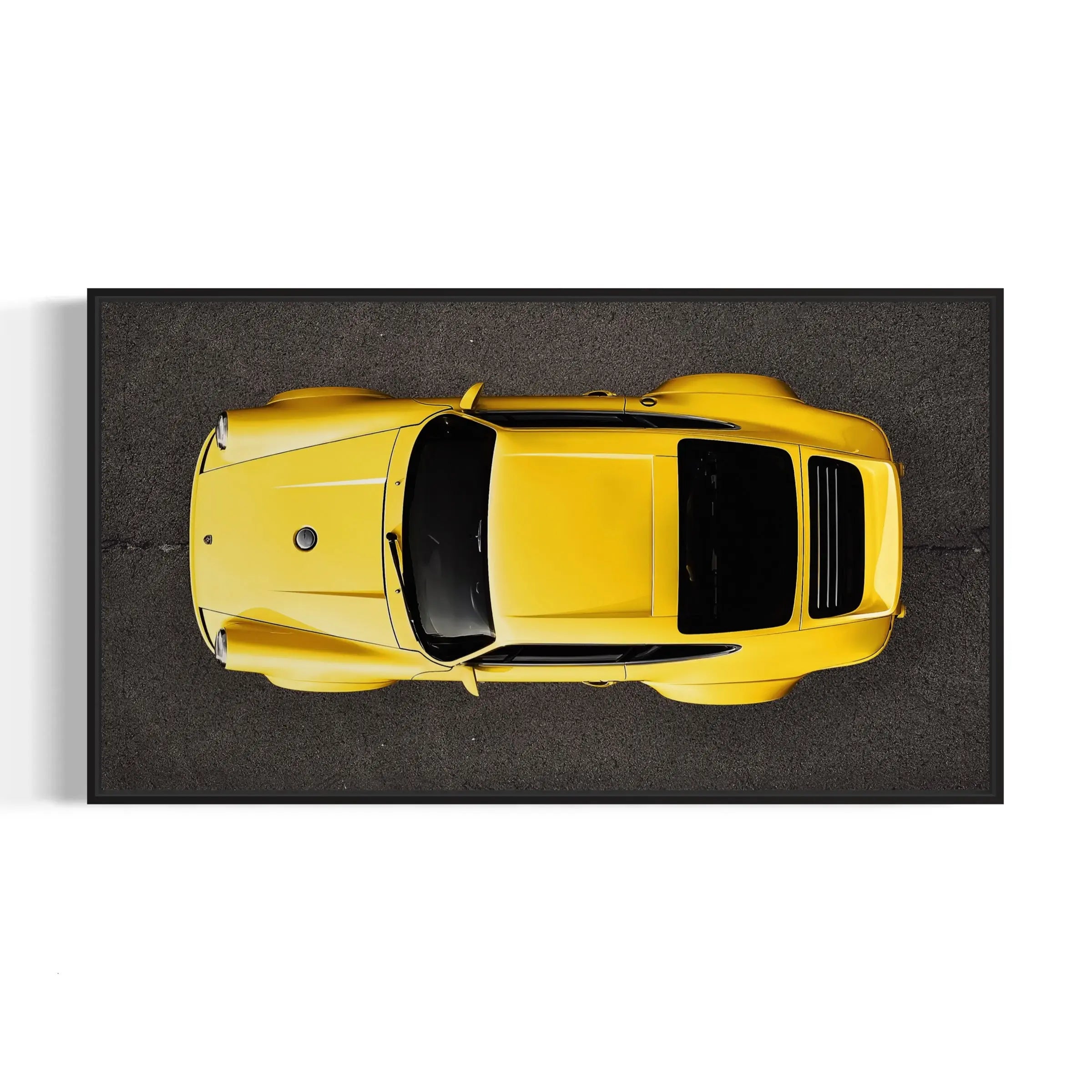 an overhead view of a yellow sports car